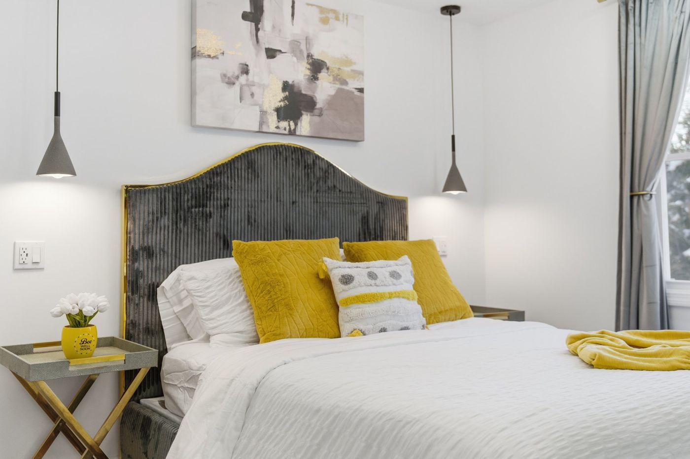 Bedside styling detail in a short-term rental bedroom